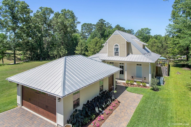 Beautiful home with a fantastic backyard oasis with a pool, balcony